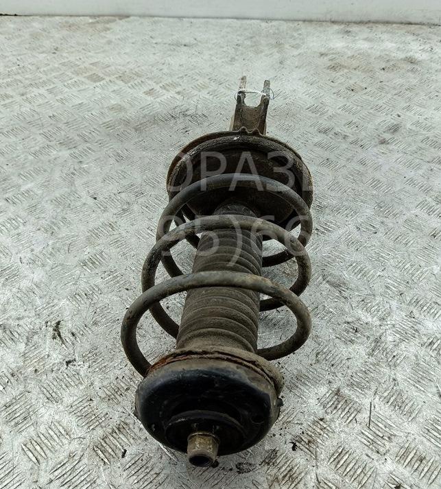 Амортизатор передний левый