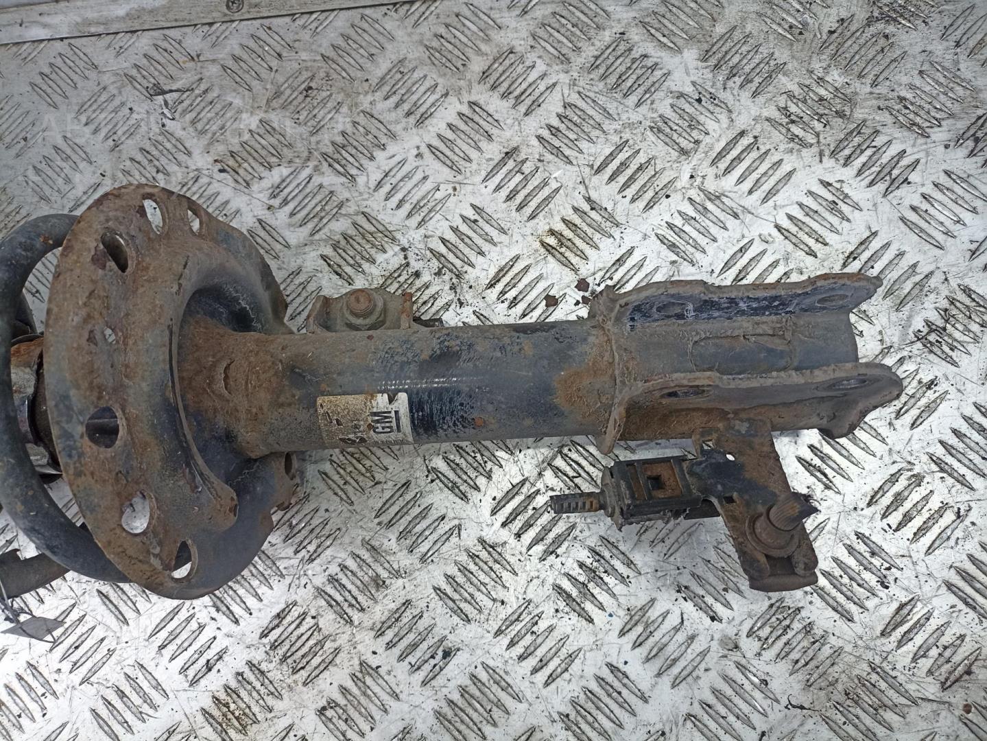 Амортизатор передний левый