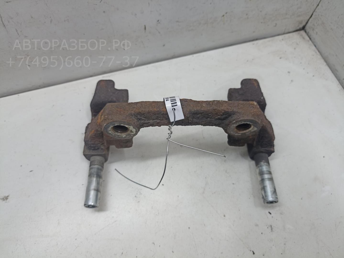 Скоба суппорта заднего