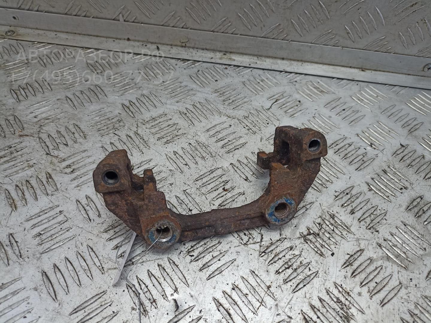 Скоба суппорта заднего