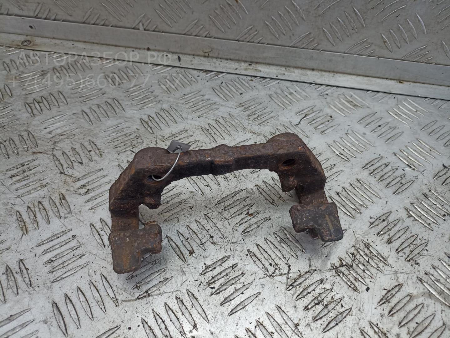 Скоба суппорта заднего