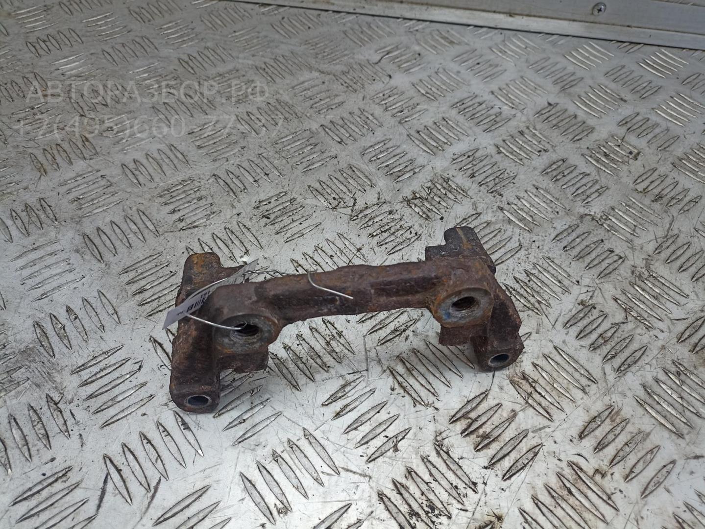 Скоба суппорта заднего