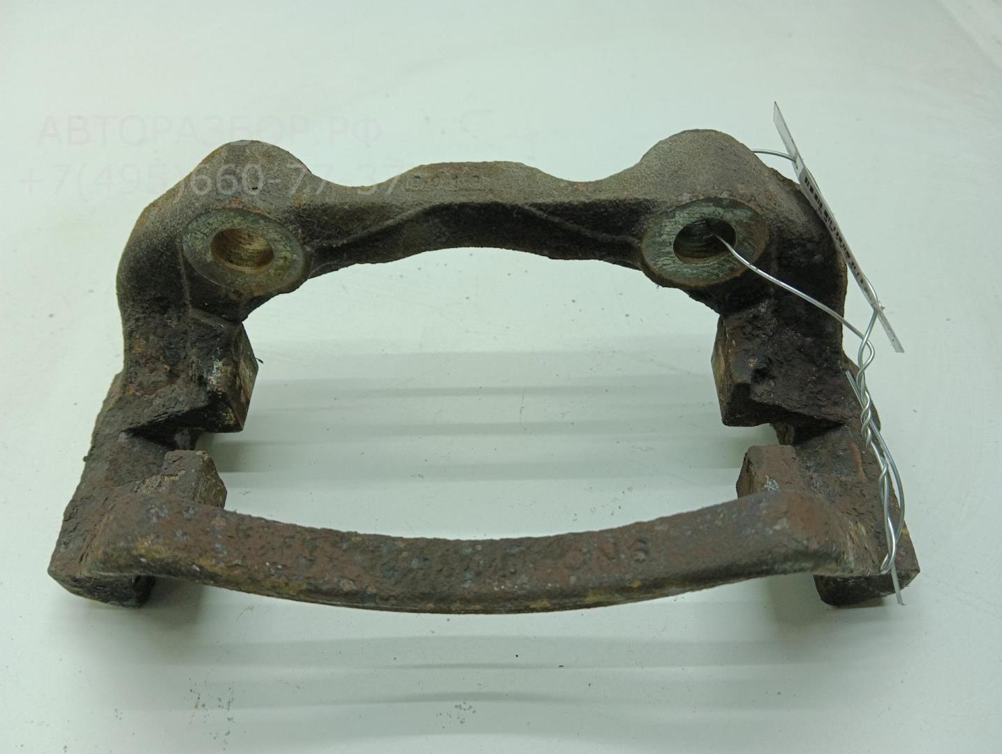 Скоба суппорта переднего