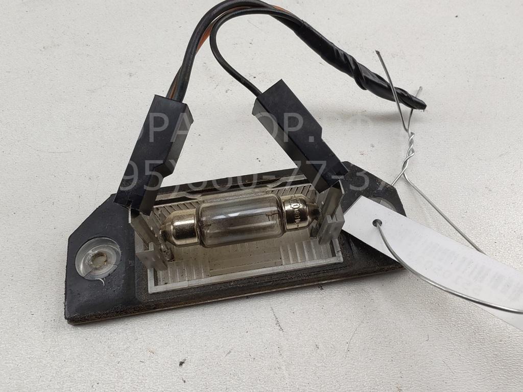 Фонарь подсветки номера