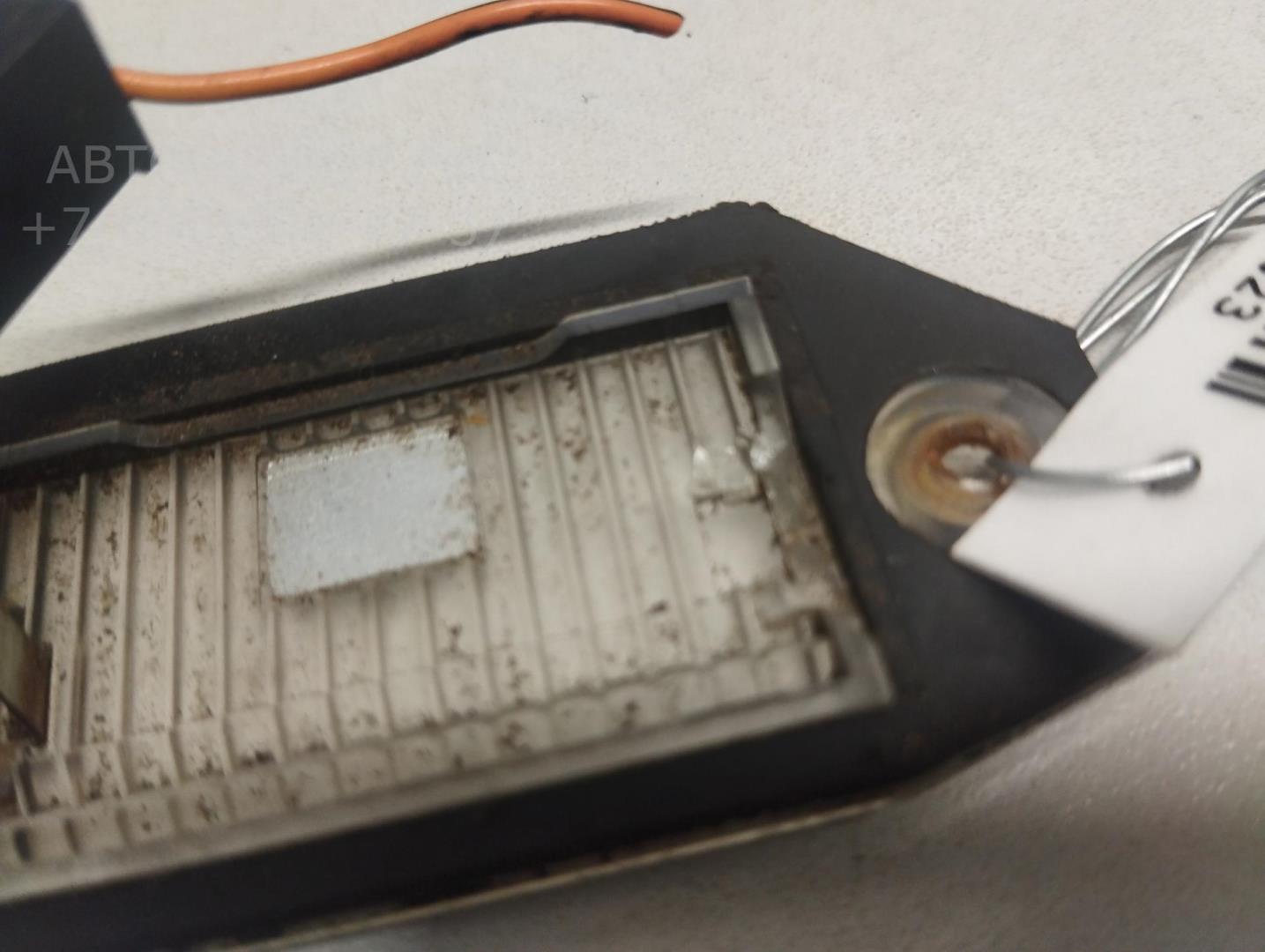 Фонарь подсветки номера