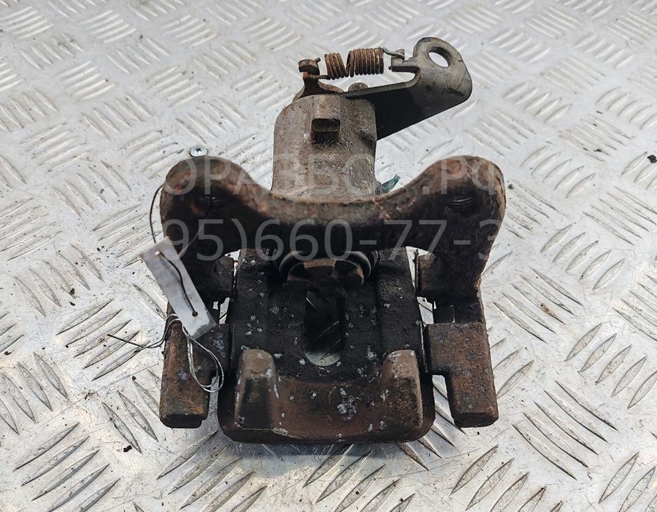 Суппорт задний левый