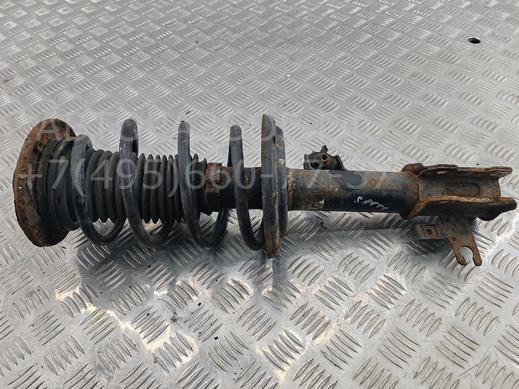 Амортизатор передний левый