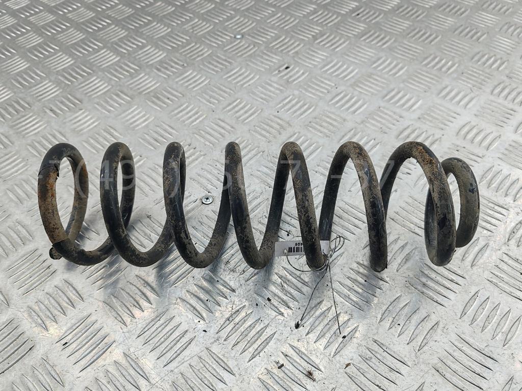 Пружина задняя