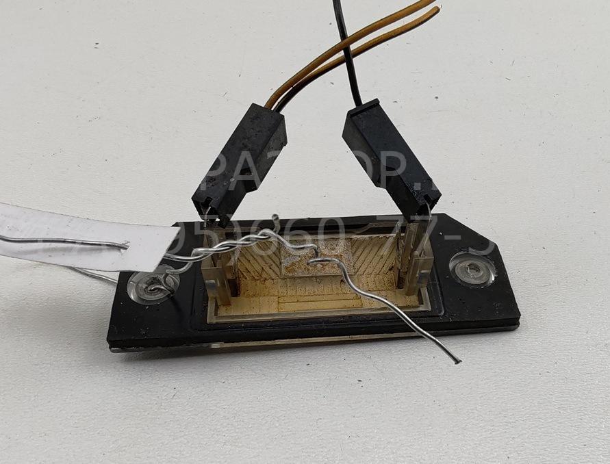 Фонарь подсветки номера