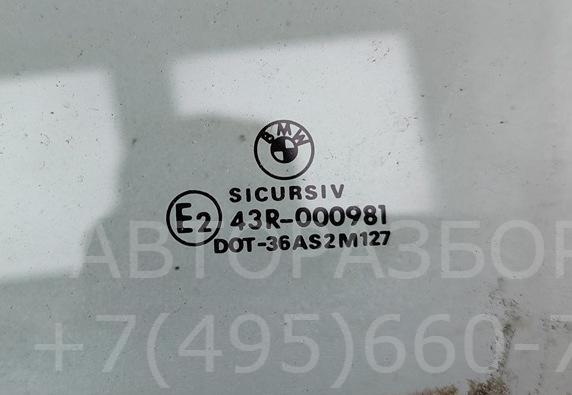 Стекло двери передней левой