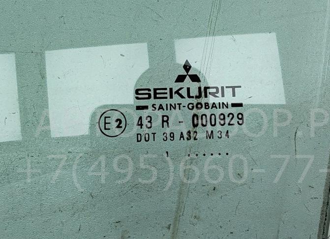 Стекло двери передней левой