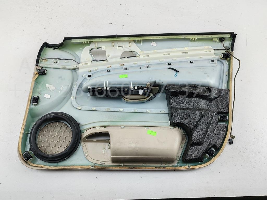 Обшивка двери передней левой