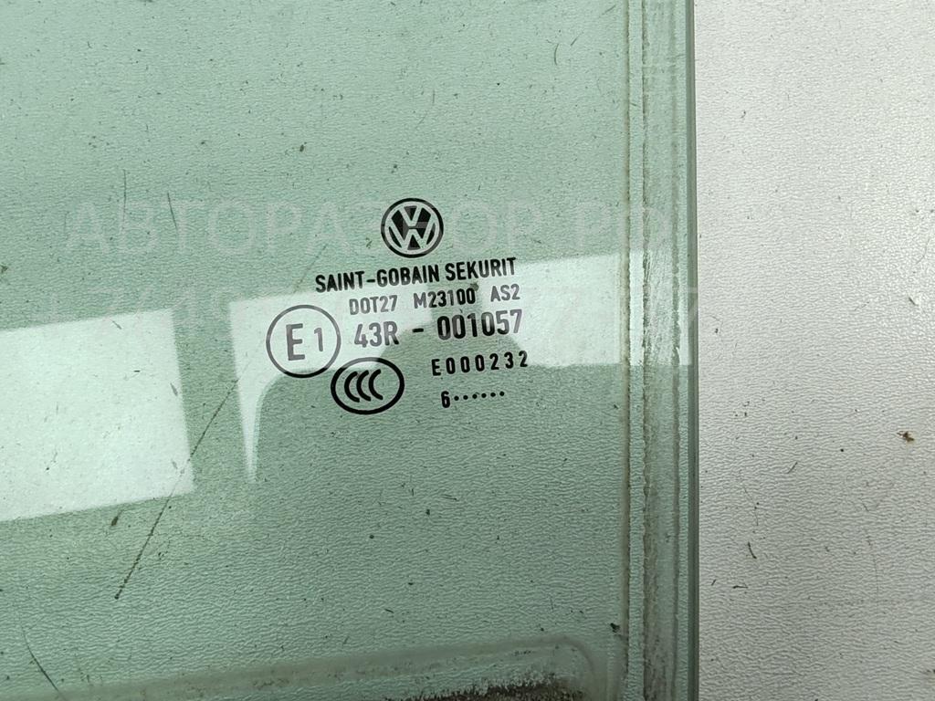 Стекло двери задней левой