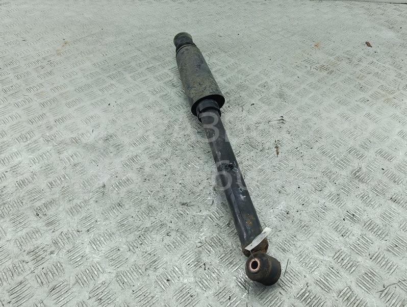 Амортизатор задний левый