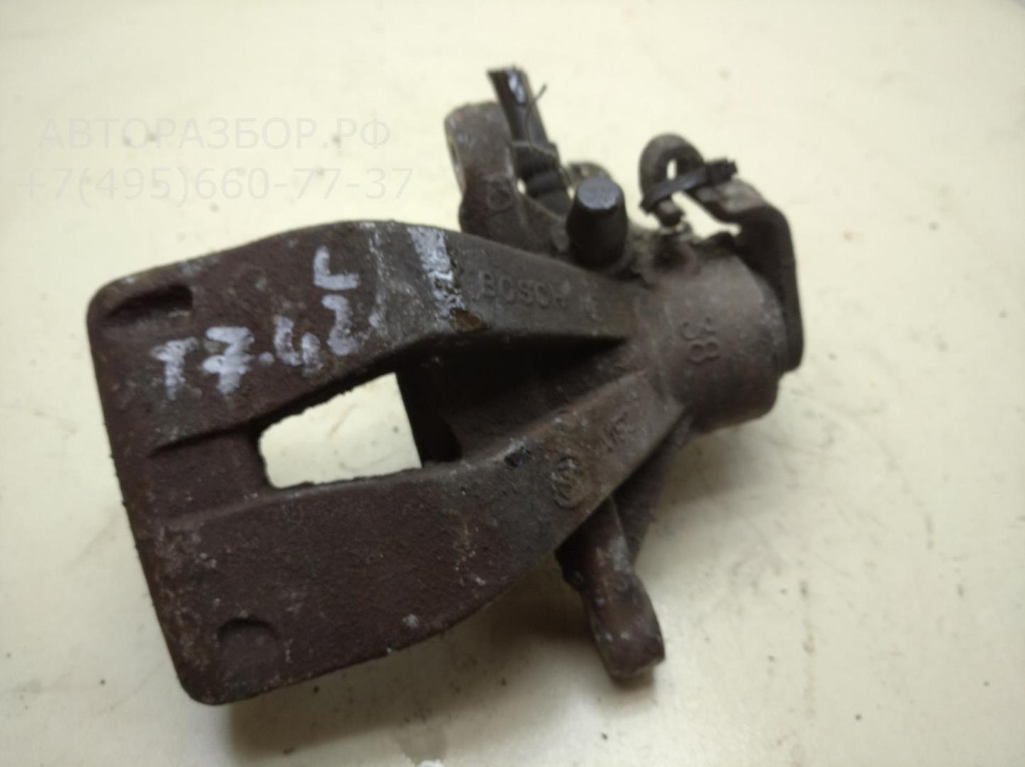 Суппорт задний левый