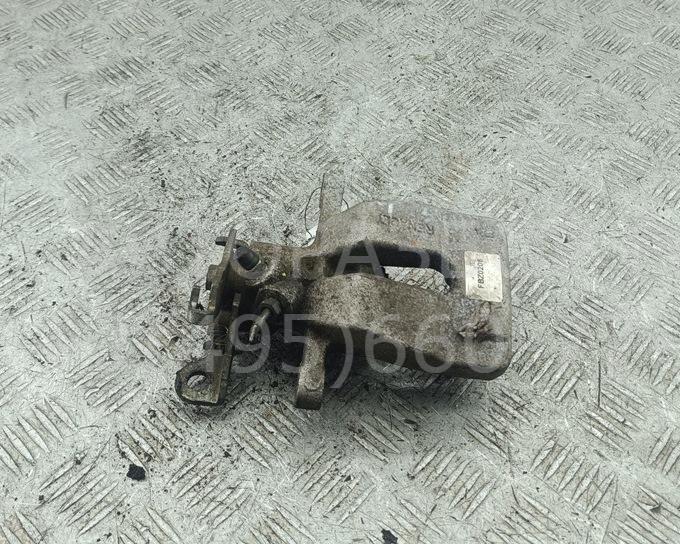 Суппорт задний левый