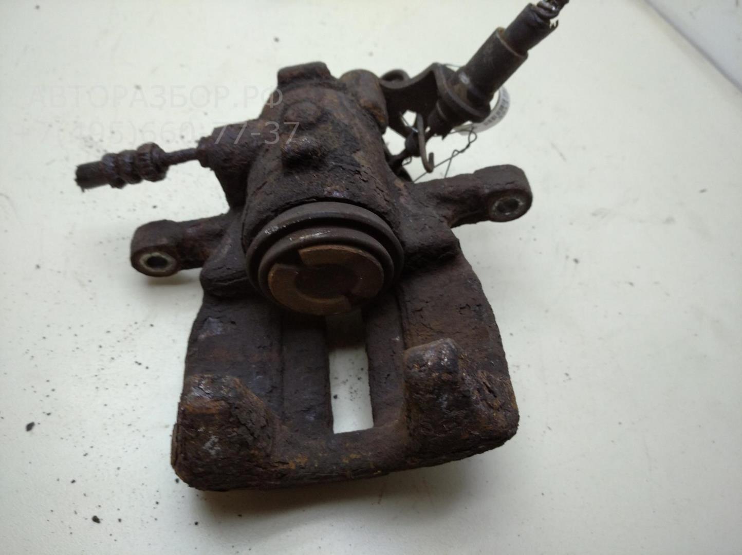 Суппорт задний левый