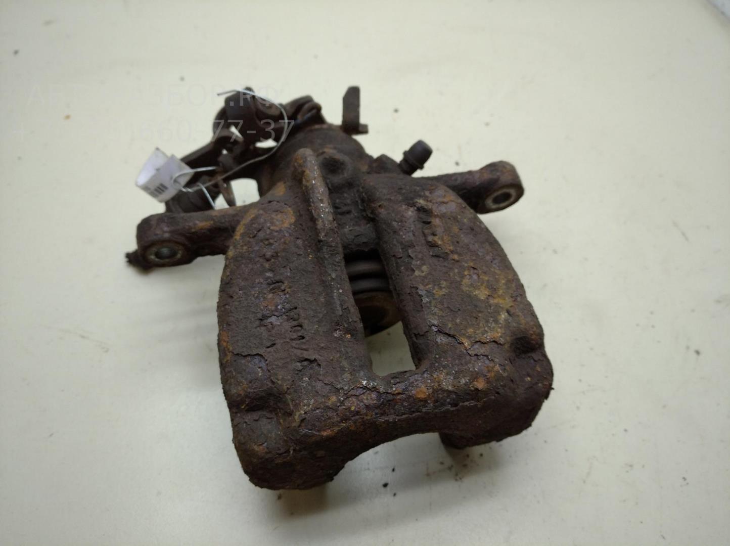 Суппорт задний левый