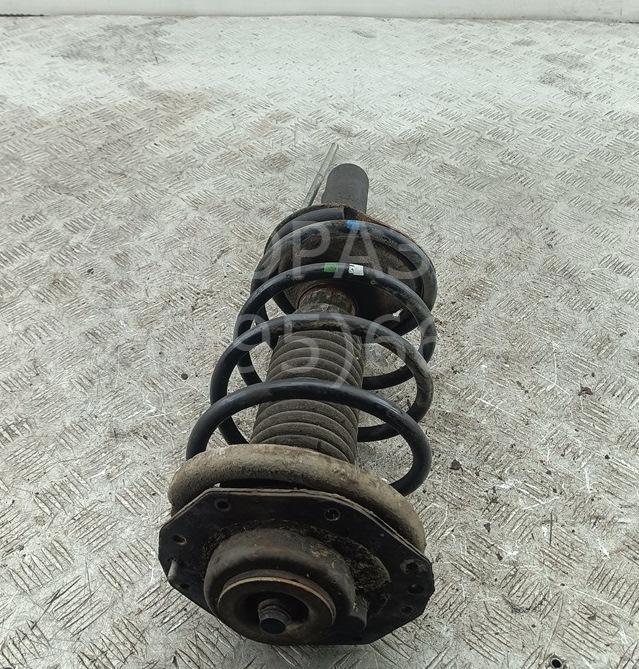 Амортизатор передний левый