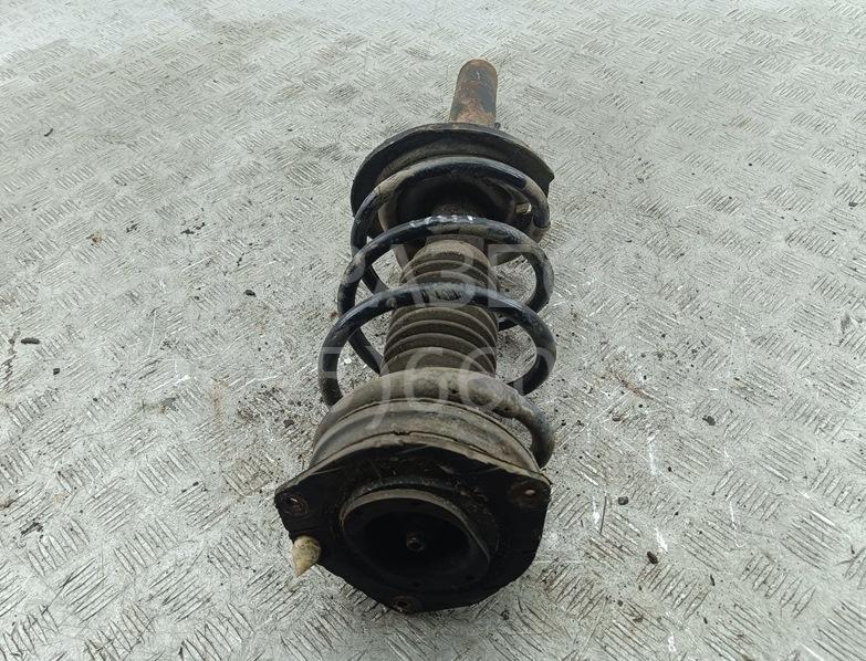 Амортизатор передний левый