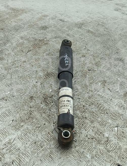 Амортизатор задний левый