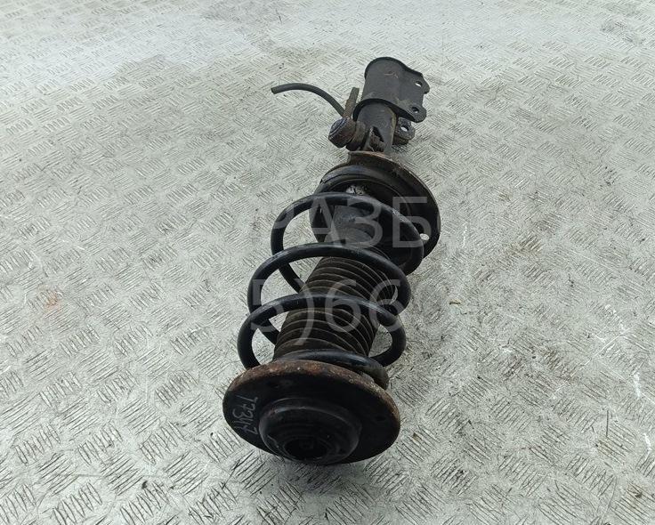 Амортизатор передний левый