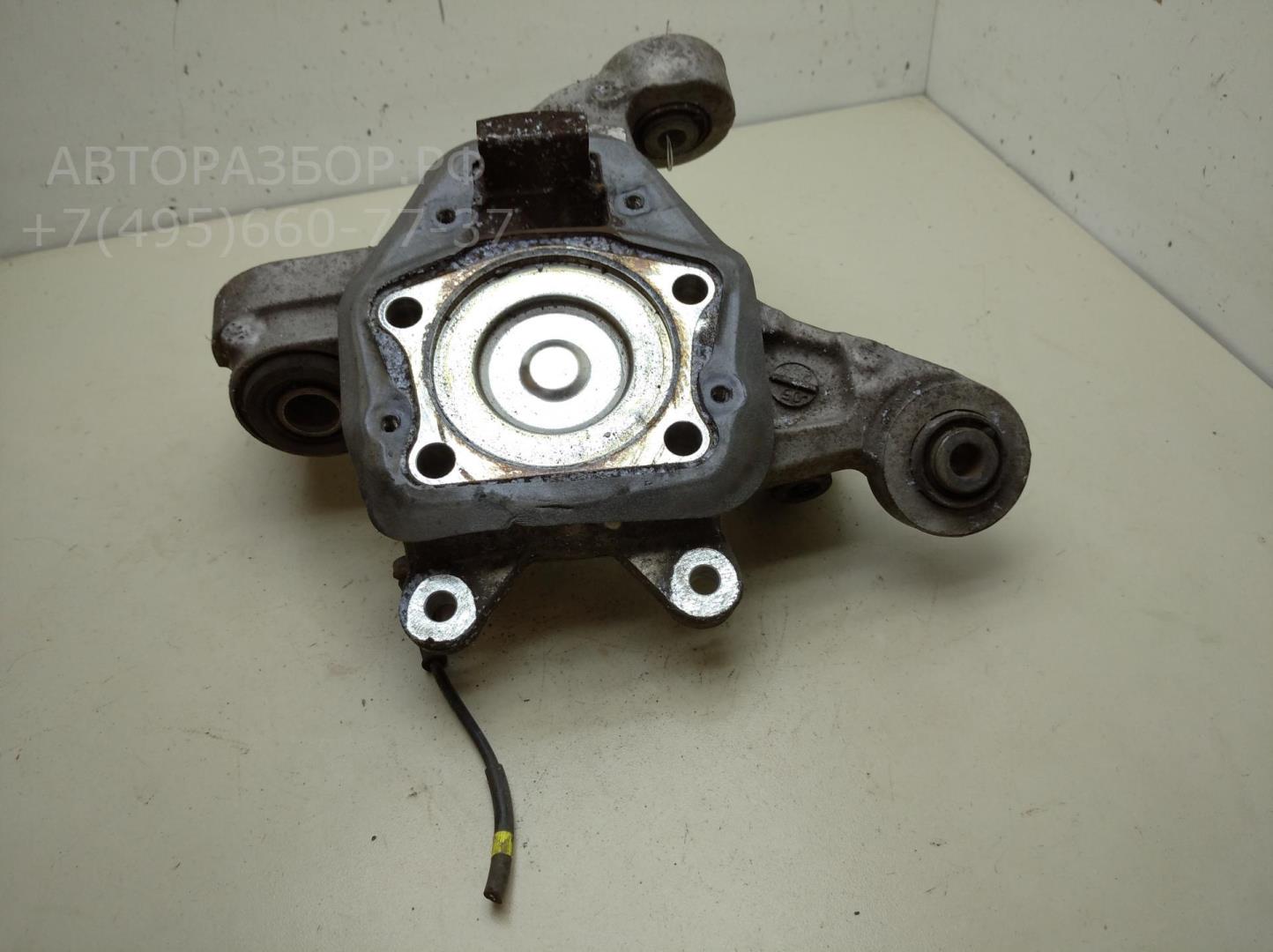 Кулак поворотный задний левый