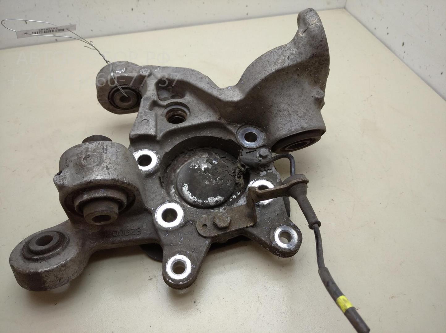 Кулак поворотный задний левый