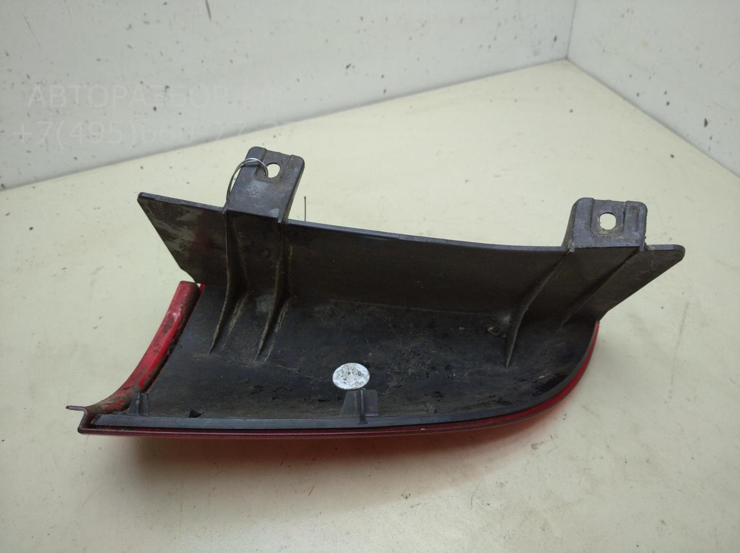 Отражатель в бампер задний левый