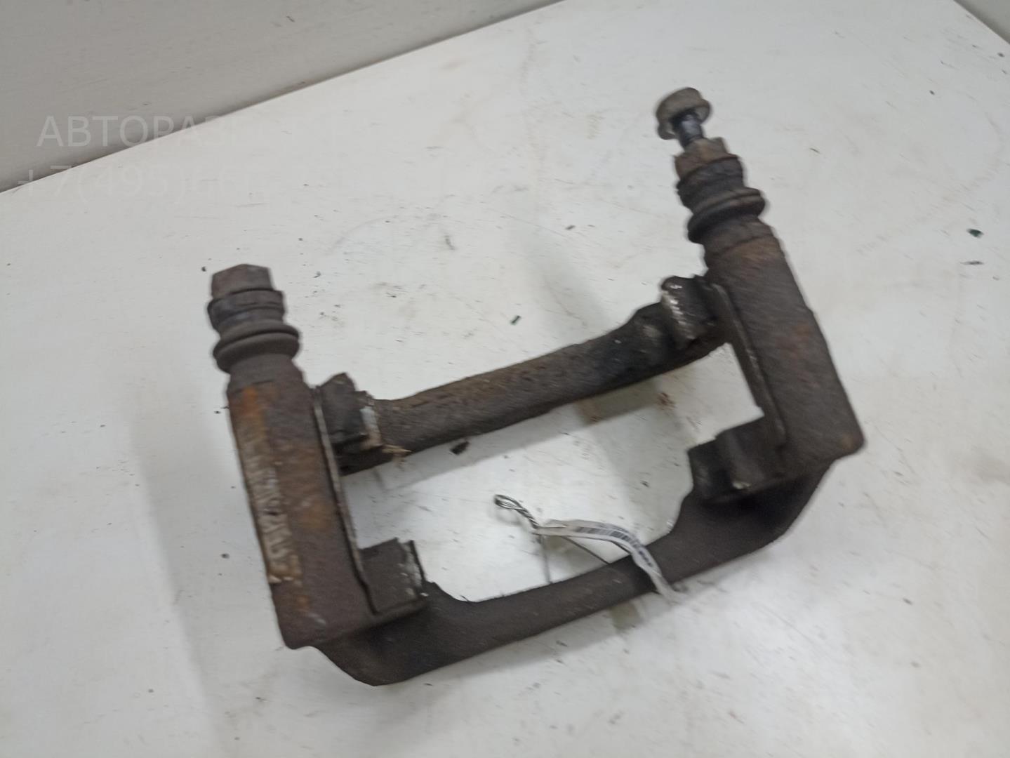 Скоба суппорта заднего