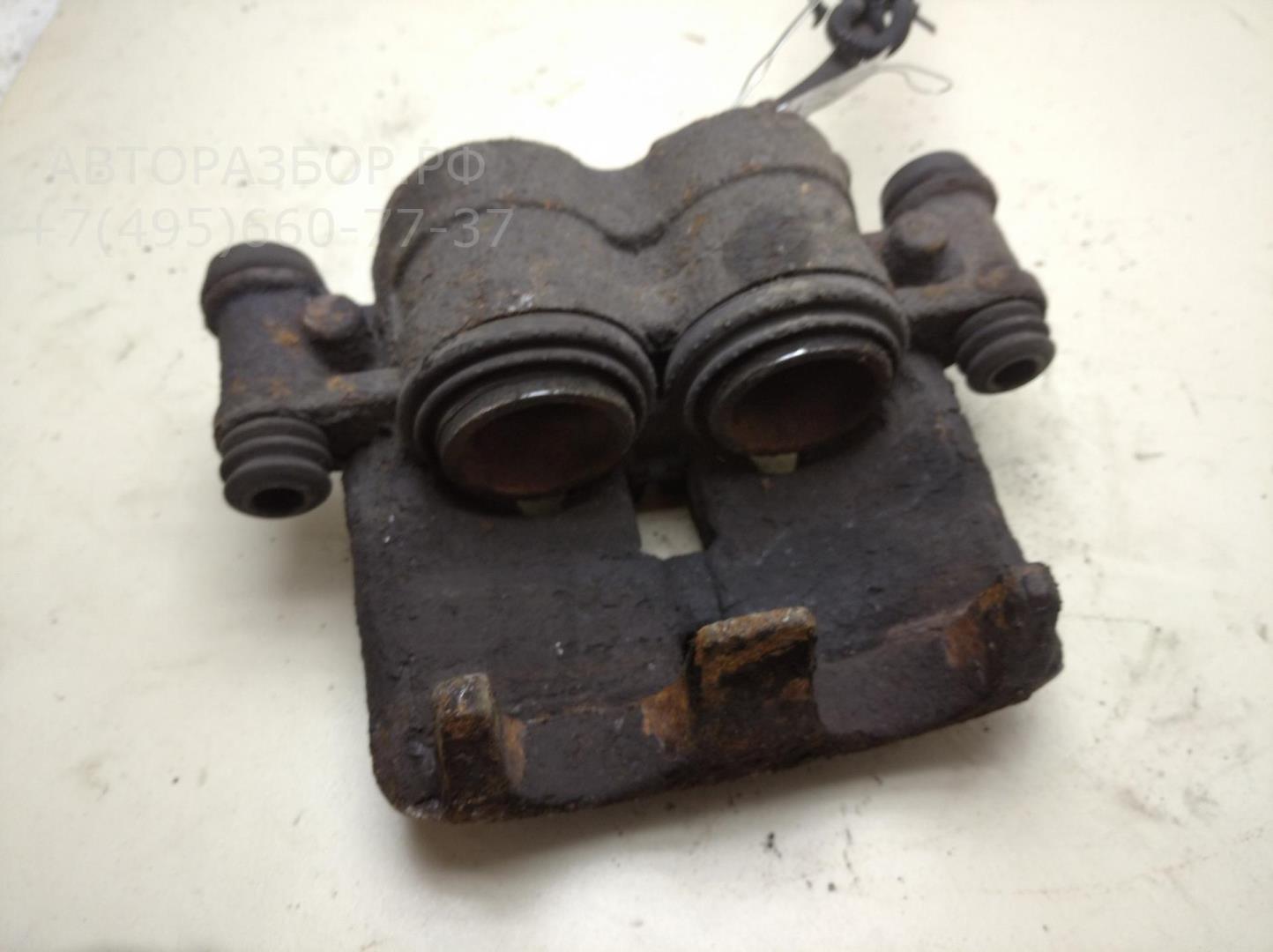 Суппорт передний левый