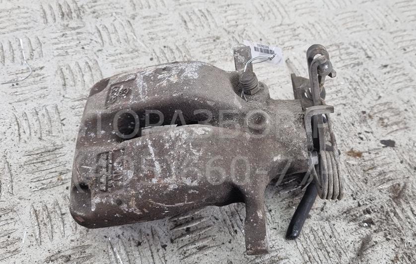 Суппорт задний левый