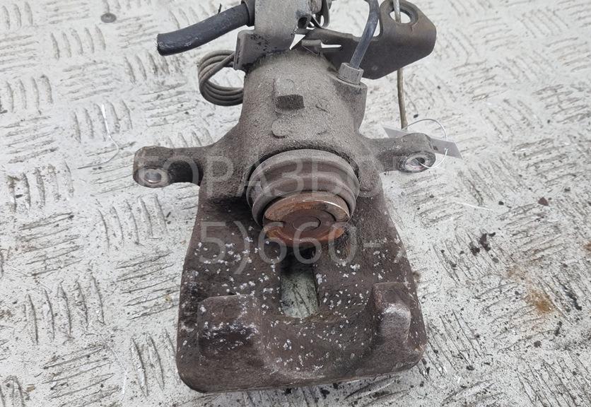 Суппорт задний левый