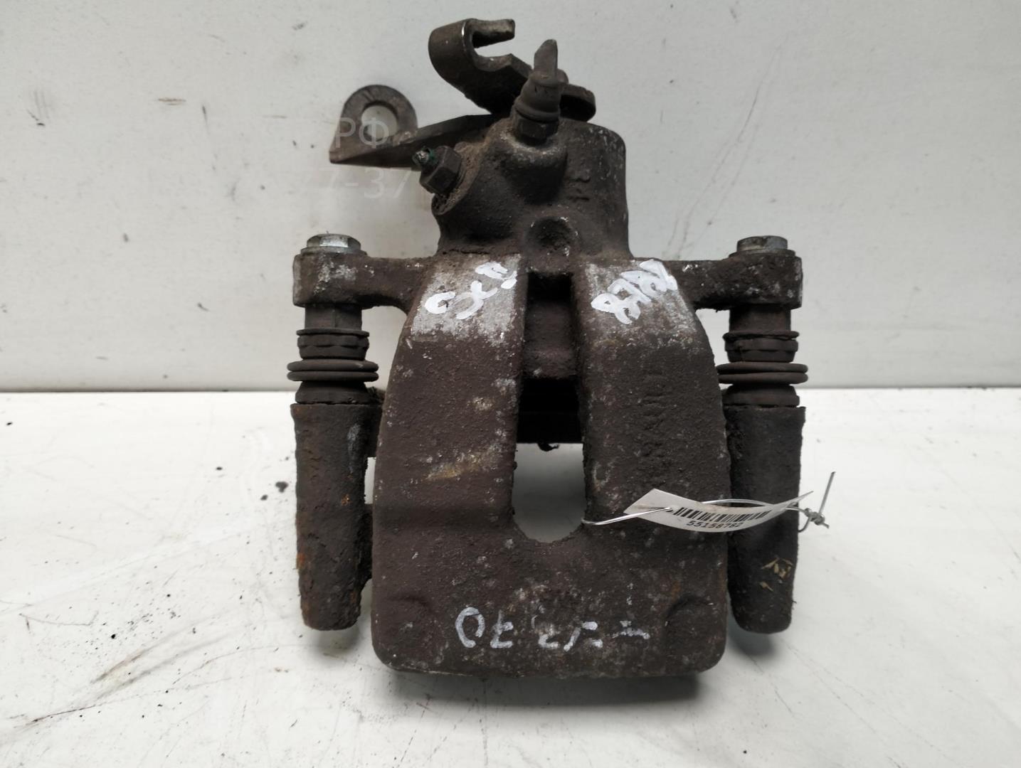 Суппорт задний левый