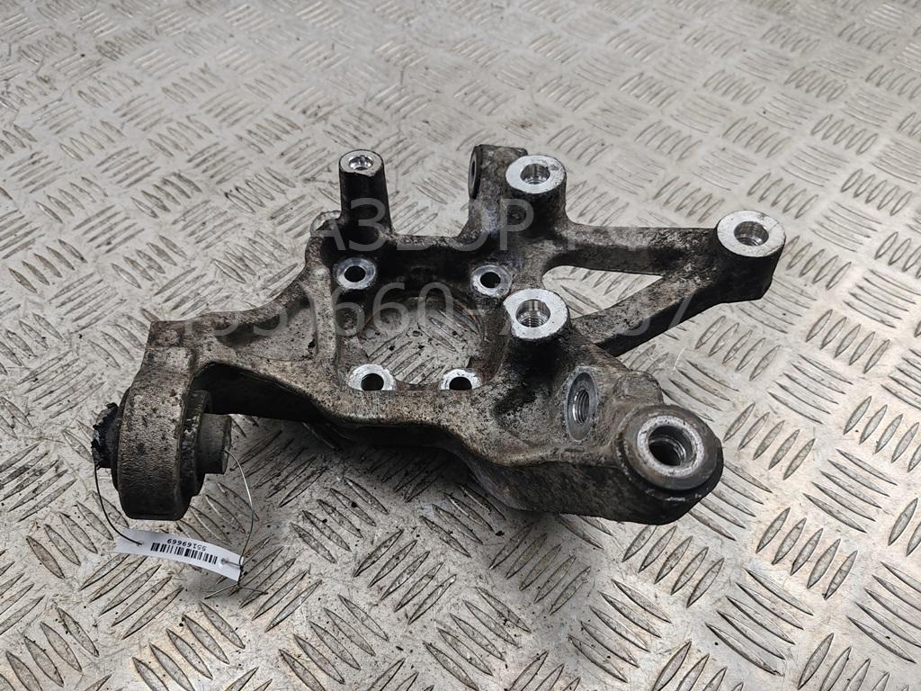 Кулак поворотный задний левый