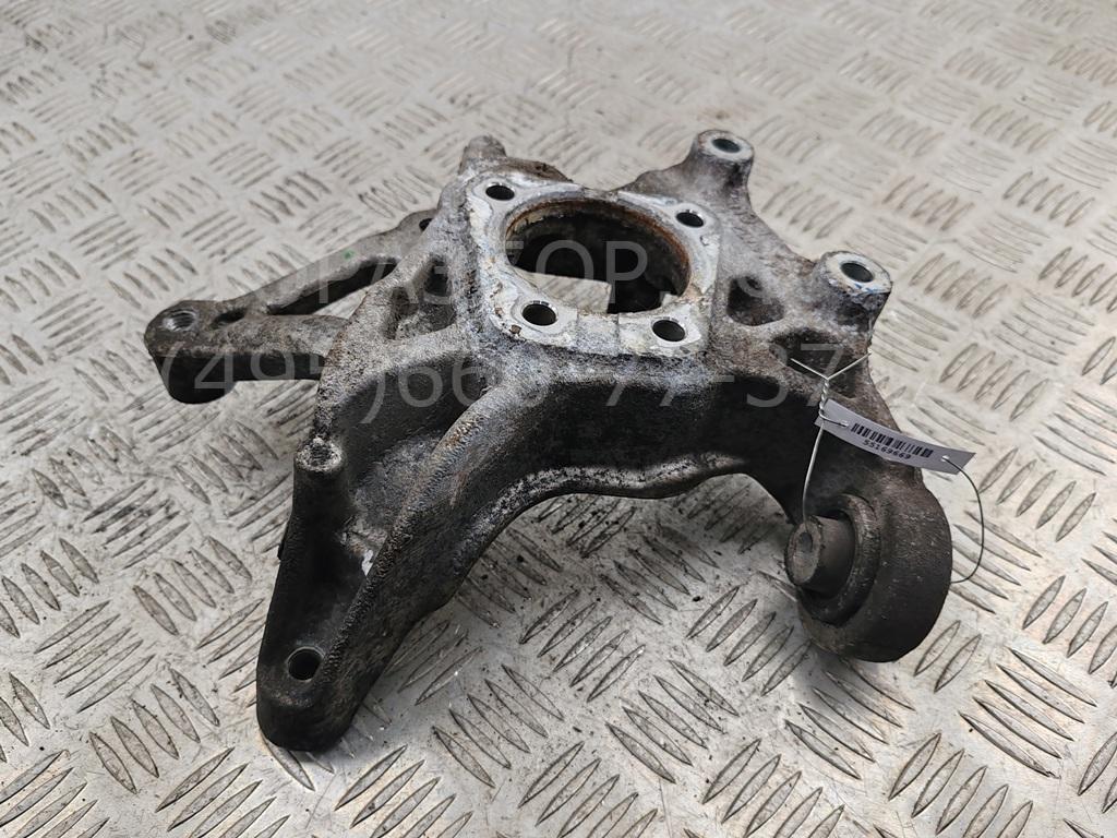 Кулак поворотный задний левый