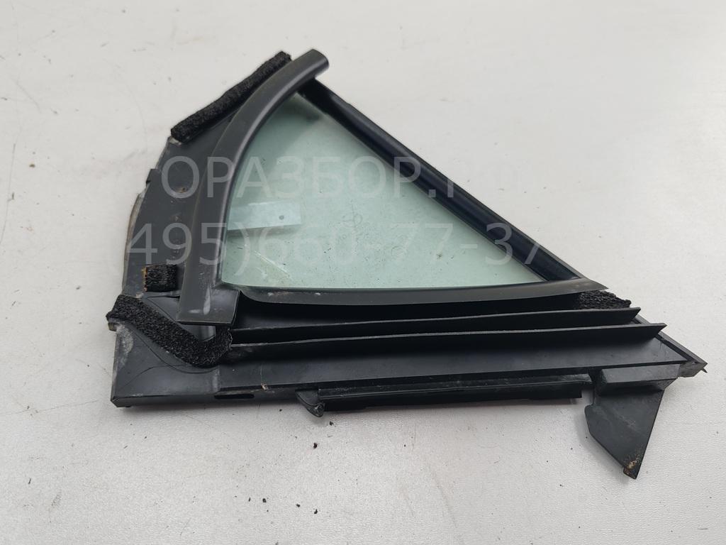Стекло двери задней левой (форточка)