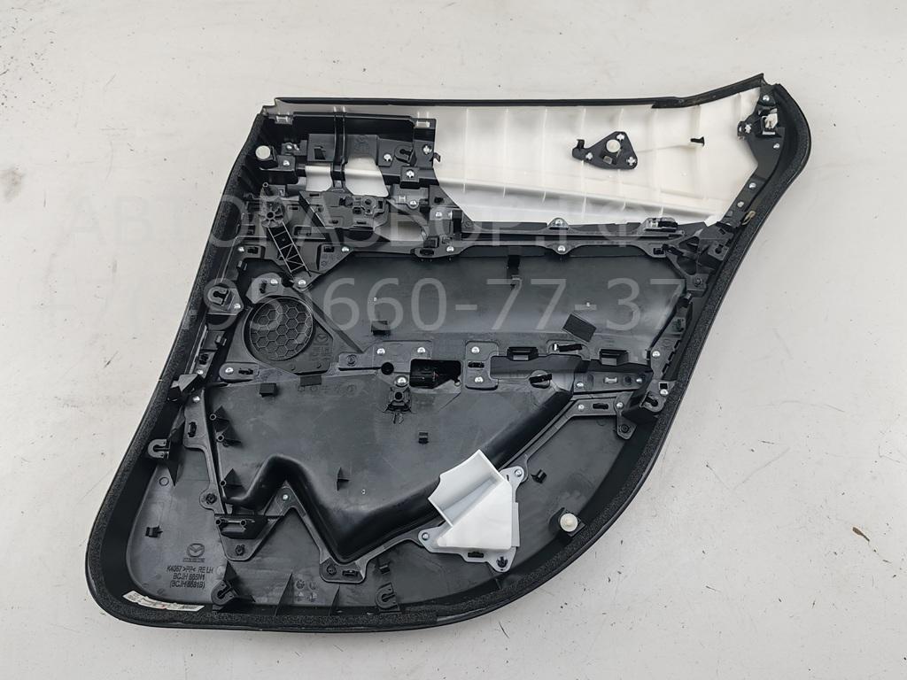 Обшивка двери задней левой