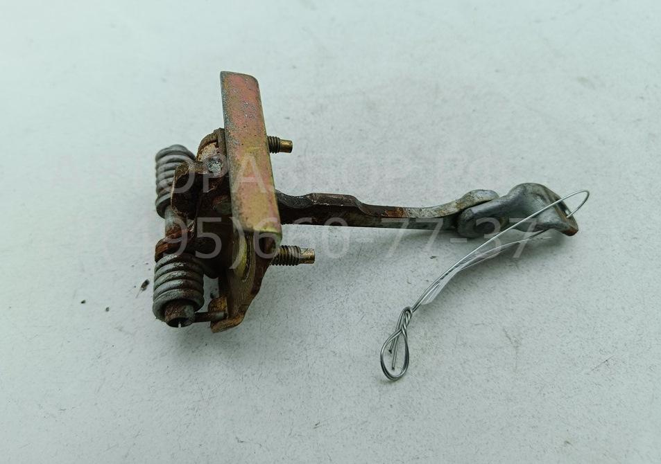 Ограничитель двери