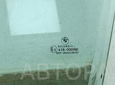 Стекло двери передней левой