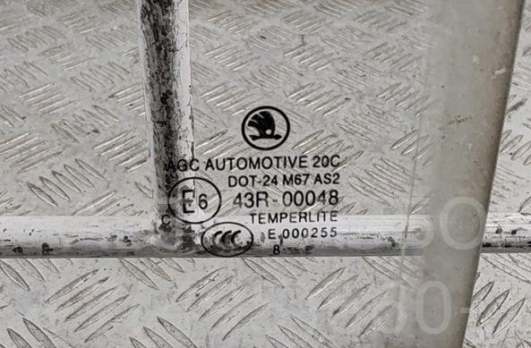 Стекло двери задней левой