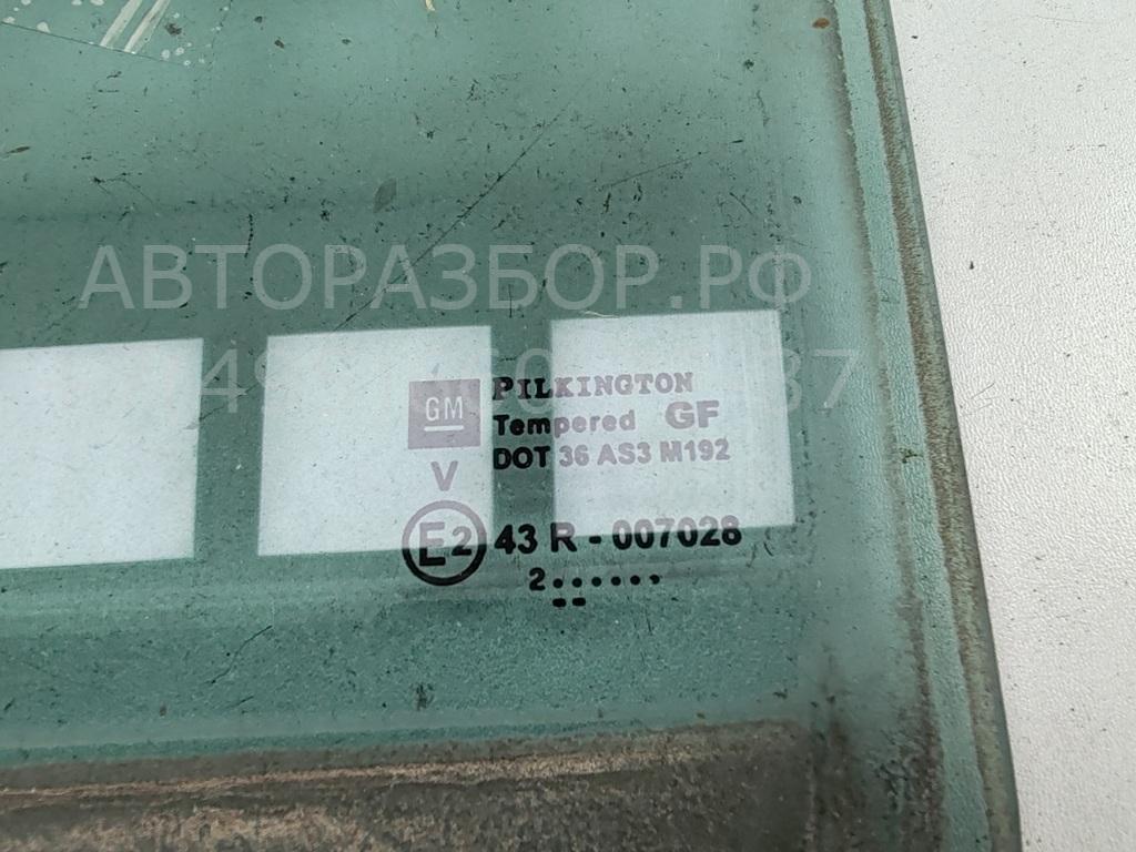 Стекло двери задней левой (форточка)