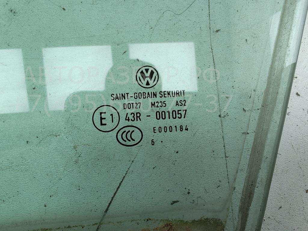 Стекло двери передней левой