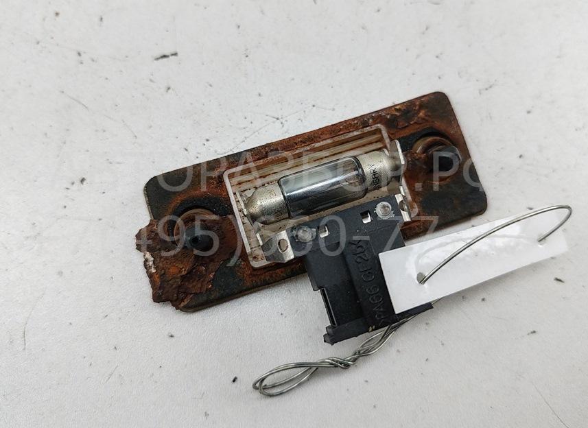 Фонарь подсветки номера