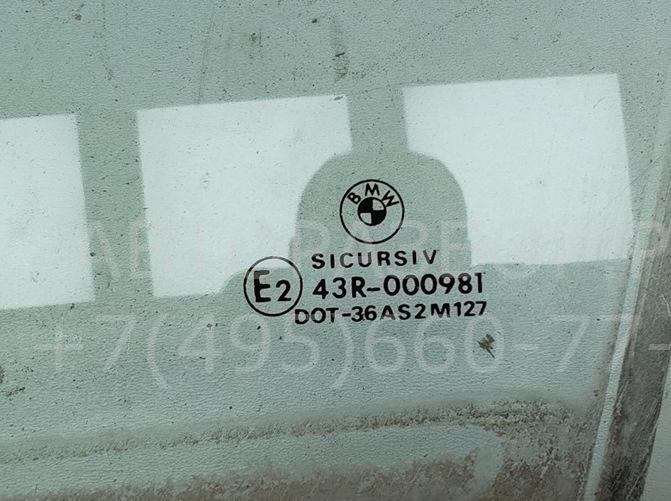 Стекло двери передней левой