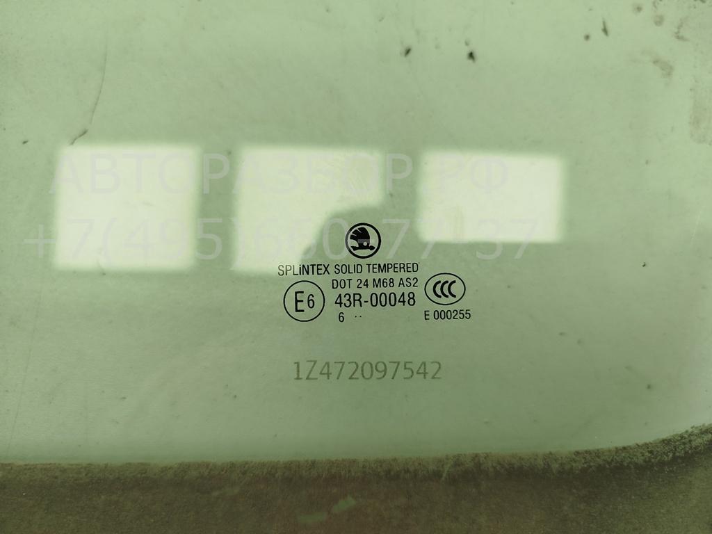 Стекло двери передней левой