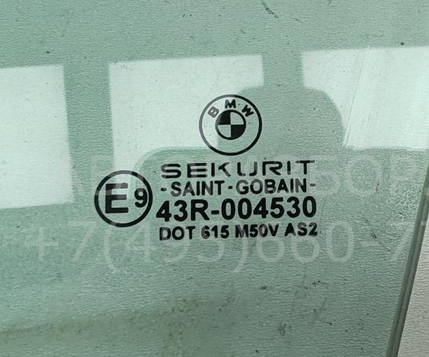 Стекло двери передней левой