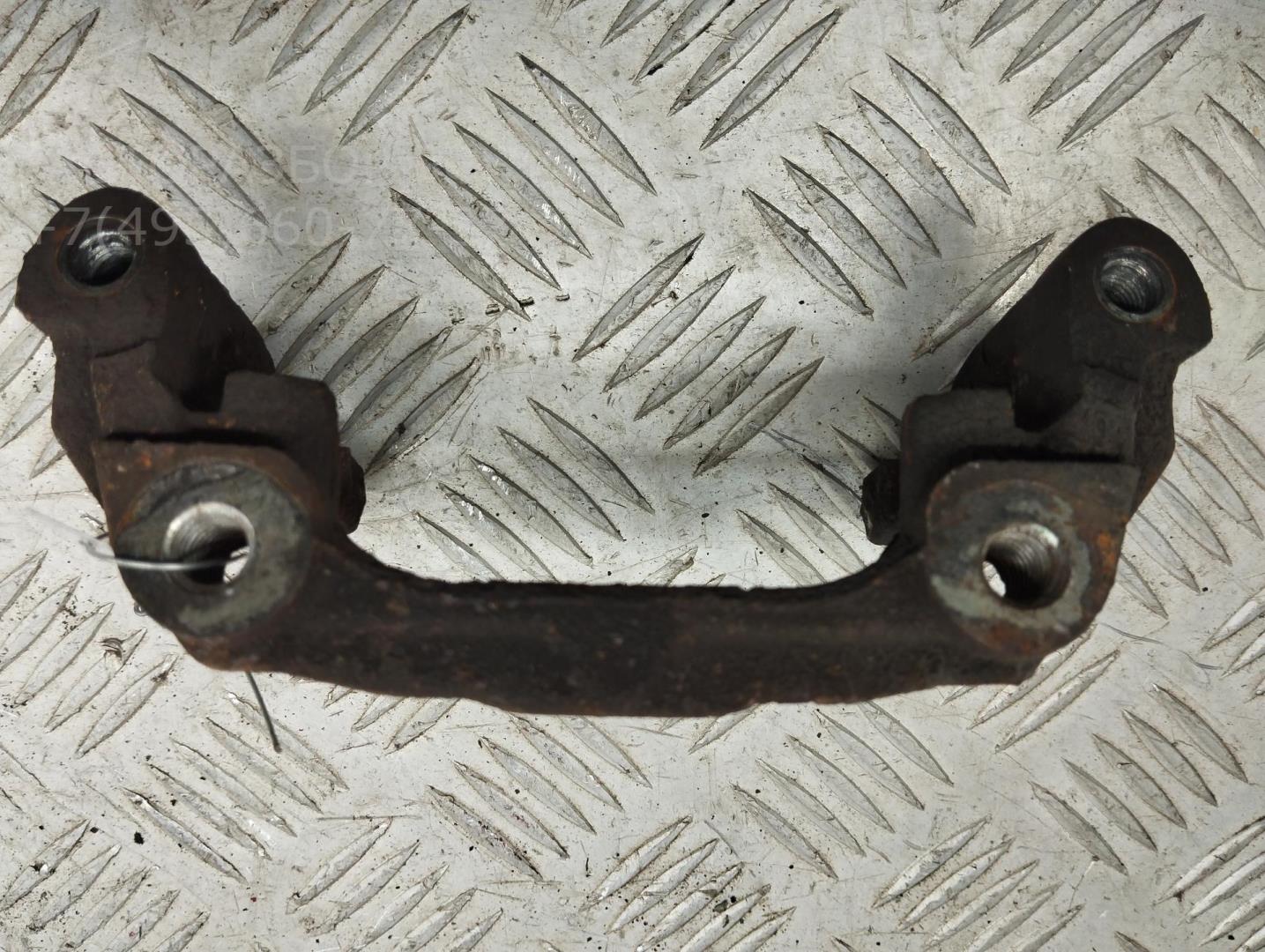 Скоба суппорта заднего