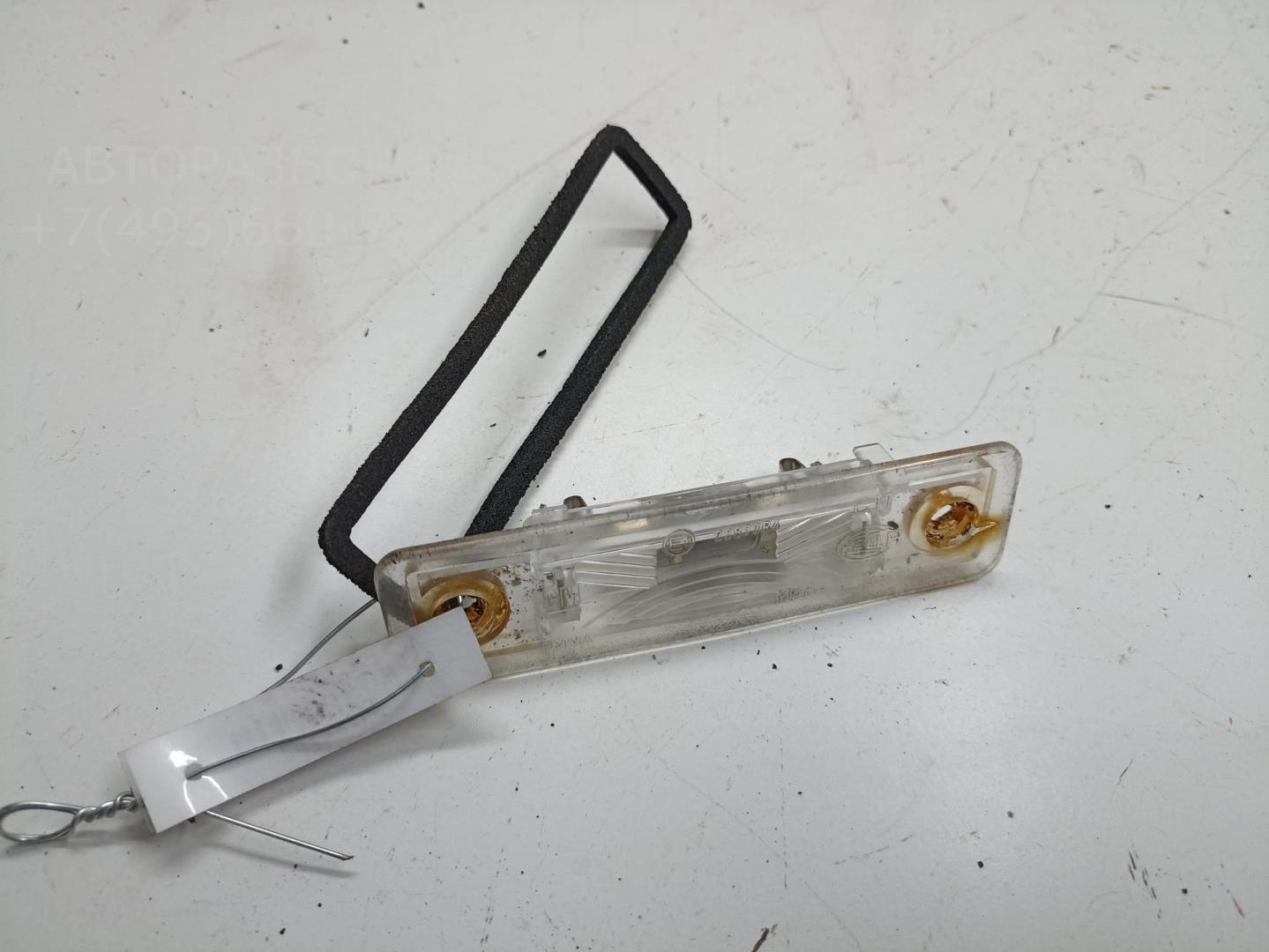 Фонарь подсветки номера