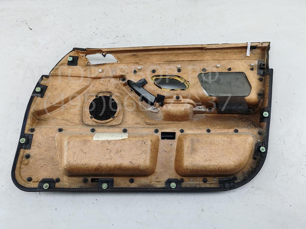 Обшивка двери передней левой